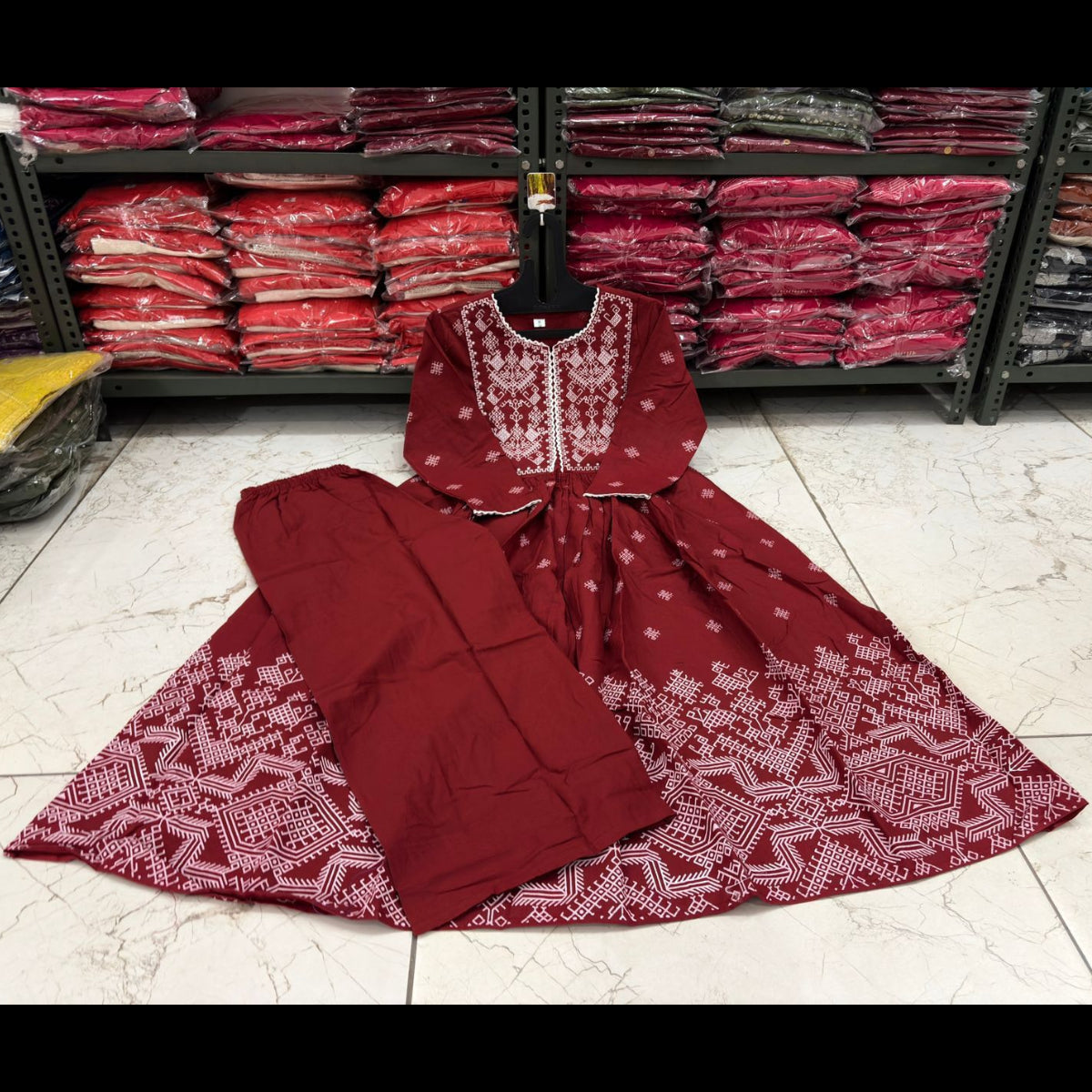 Ruby Weave Embroidered flared Kurta with plazzo