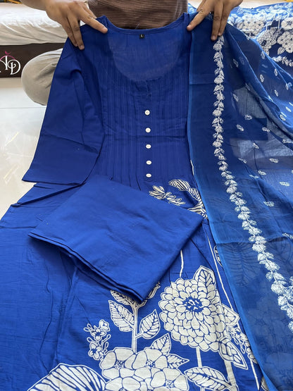 Heavy Suit Set decorated with intricate hand embroidery, zari weaving and prints